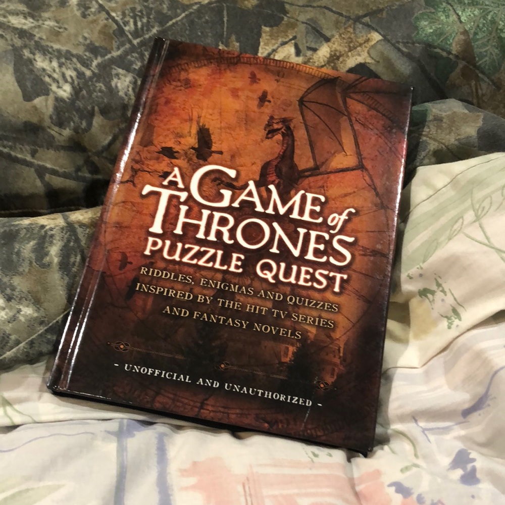 A Game Of Thrones puzzle quest book. Like new condition!!